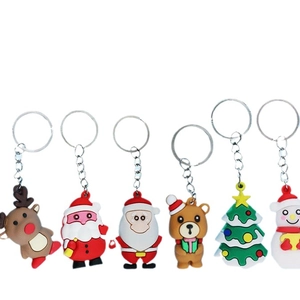 3D PVC Christmas keychains featuring Santa, reindeer, and snowmen set on white background