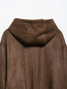 Close-up of brown suede-textured hooded jacket showing detailed back fabric and stitching