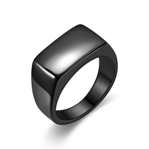 Macro detail of high-polished black rectangle signet ring made of stainless steel