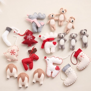 Handmade wool felt Christmas ornaments collection featuring reindeer, trees and bears