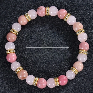 Detail of 8mm pink natural stone beads with crystal spacers and yoga meditation text