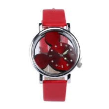 Close-up of red leather watch band with silver case and Mickey mouse dial silhouette
