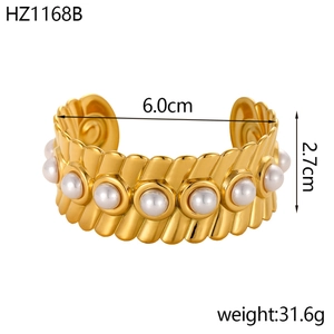 Detailed size specifications of the gold open cuff bracelet with white pearl inlay