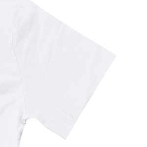 Detail of white short sleeve shirt showing linen fabric texture and sleeve stitching