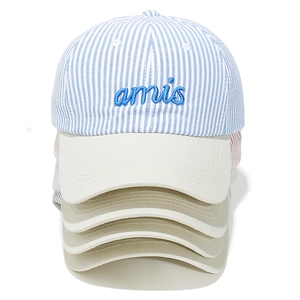 Detailed close-up of striped baseball cap fabric texture and amis letter embroidery