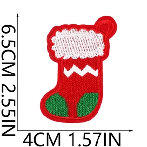Detailed close-up of a Christmas stocking embroidery patch with size measurements