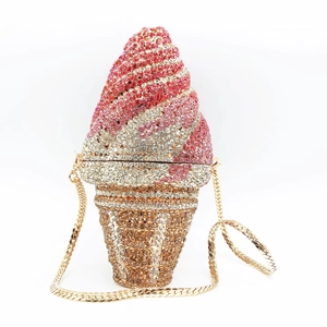 Detail of pink and white crystal encrusted ice cream clutch with gold chain strap