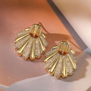 Exquisite 18K gold plated fan-shaped earrings with pavé set sparkling zircon stones
