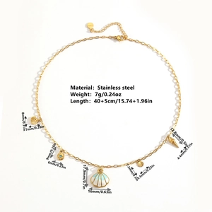 Golden stainless steel necklace featuring sea shells and blue enamel conch charms