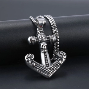 Vintage stainless steel skull and anchor pendant necklace with a punk gothic style