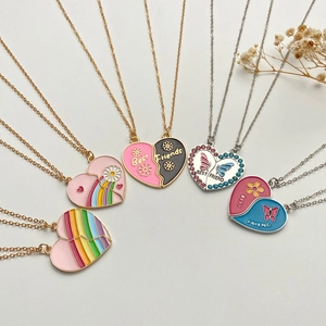 Five sets of colorful enamel Best Friends heart necklaces with butterfly and flower patterns