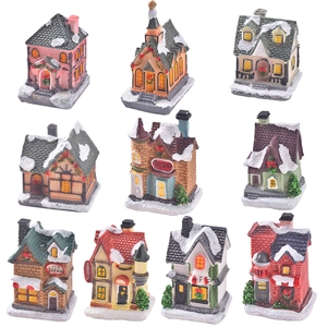 Set of 10 miniature resin Christmas village houses including toy shop and cafe models