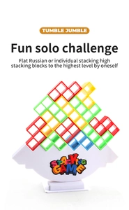 Close-up of colorful plastic stacking blocks on white base with English stacking game text