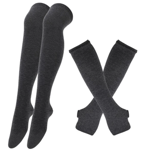 Detail of dark grey knitted over-knee high socks and matching fingerless arm warmer set
