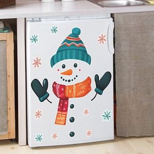 Christmas snowman fridge sticker set on a white appliance in a warm kitchen scene
