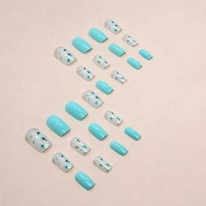 Short square press-on nails with mint green floral patterns and glossy Tiffany blue finish