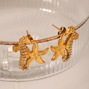 Boucles d'oreilles hippocampe et étoile de mer dorées avec cristaux sur verre