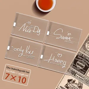 Detailed view of 7x10cm frosted plastic food bags with white script for cookie packaging