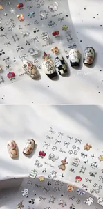 Laser holographic nail stickers featuring cute hand-drawn puppies and bowties