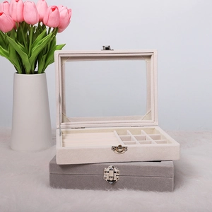 Elegante portagioie in velluto con coperchio in vetro e scomparti in beige e grigio