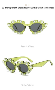 Close-up of green flower-shaped frame sunglasses with pearl accents and dark lenses