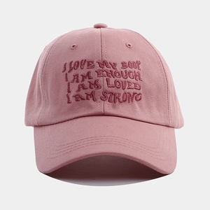 Pink cotton baseball cap with embroidered positive quotes and adjustable soft top crown