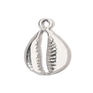 Detailed macro view of silver seashell pendant with polished finish for DIY jewelry