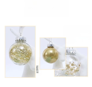 Detail of clear Christmas ball ornaments with gold glitter, beads, and silk filling