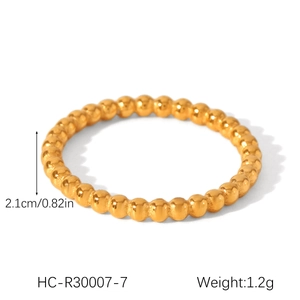 Detail view of gold beaded ring showing 2.1cm width and 1.2g weight specifications