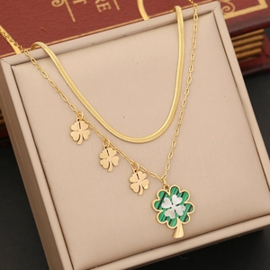 Double-layer stainless steel flower necklace with green malachite clover pendant on beige box