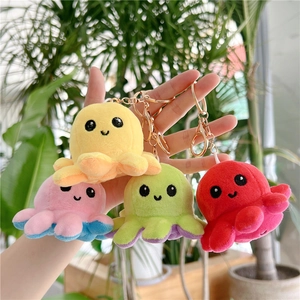 Reversible plush octopus keychain charms in yellow pink green and red colors