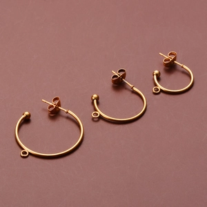 Three sizes of golden stainless steel C-shape earring hoops with small hanging loops
