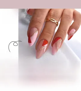 Pink and red geometric press-on nails with gold glitter lines in almond shape