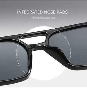 Detail view of integrated nose pads on black square frame sunglasses for comfort