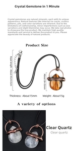 Macro detail of drop-shaped tiger eye and white crystal pendants with copper frame