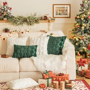 Set of four plush Christmas pillows with 3D tree textures in green and white colors