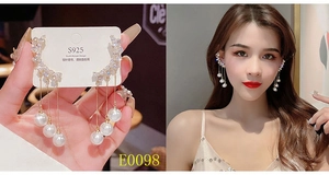 Detail of S925 silver needle pearl tassel earrings showing the elegant drooping length