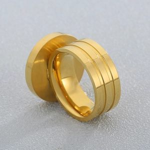Polished gold stainless steel men's ring with three parallel engraved decorative lines