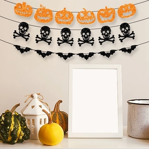 Glittery Halloween banner set featuring orange pumpkins, black skulls, and bats decorations