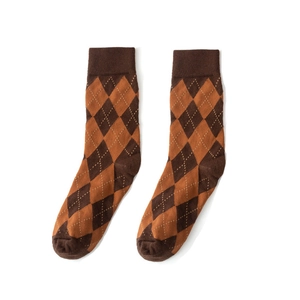 Vintage argyle knit crew socks in brown and orange pattern for women in autumn