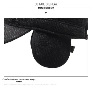 Detail of men winter hat featuring thick textured fabric and folding ear flaps for warmth