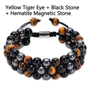 Triple-row braided bracelet featuring tiger eye, black stone and magnetic hematite beads