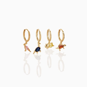Detailed row of four gold dinosaur earrings with pink, blue, yellow, and red zircon stones