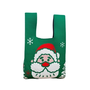 Christmas knit tote bag in forest green with Santa Claus pattern and white snowflakes