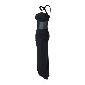 Detail of black halter maxi dress showing sheer mesh panel and bodycon ruched fabric