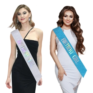 Sparkling silver and blue Birthday Girl sashes worn by models for party celebrations