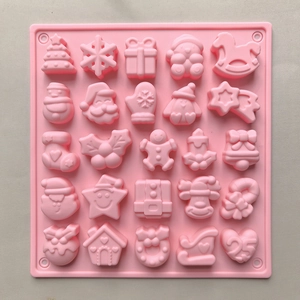 Pink silicone mold with 25 Christmas patterns for chocolate pudding and cake baking