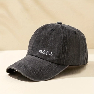 Retro washed charcoal cotton baseball cap featuring white mama embroidery in a 45-degree view