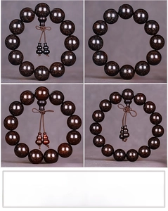 Macro shot of high-density Blood Sandalwood prayer beads with golden flecks