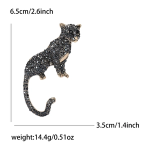 Vintage gold leopard brooch with black rhinestones and product size specifications
